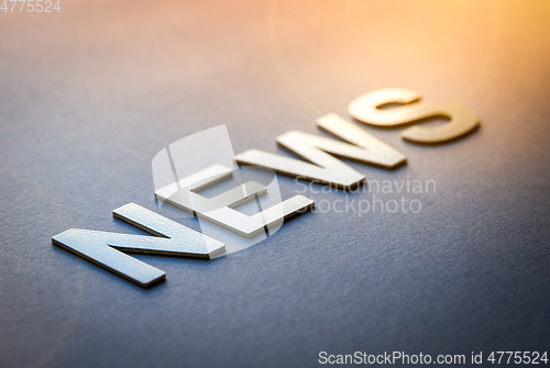 Image of Word news written with white solid letters