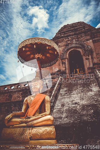 Image of Gold Buddha, Wat Chedi Luang temple big Stupa, Chiang Mai, Thail