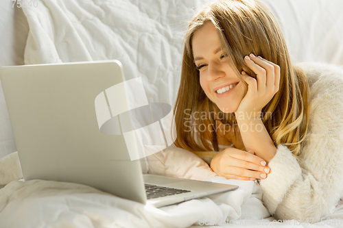 Image of Beautiful young woman relaxing at home, comfort and calm
