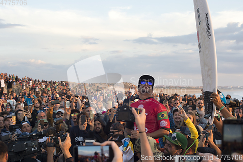 Image of   Italo Ferreira champion surfing celebrating