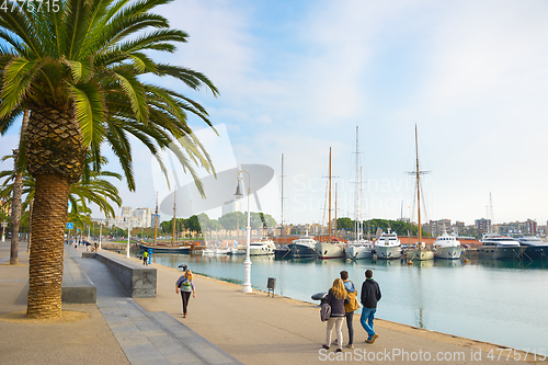 Image of People walking Port Vell Barcelona