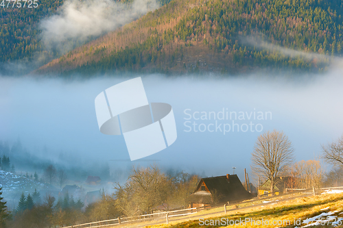 Image of Mountain landscape with wooden hut