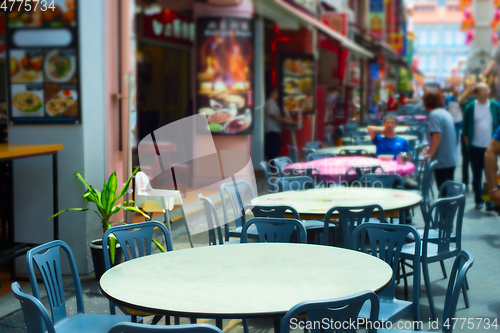 Image of Street restaurant tables. Singapore Chinatown