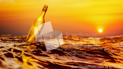 Image of Message in a bottle sunset background