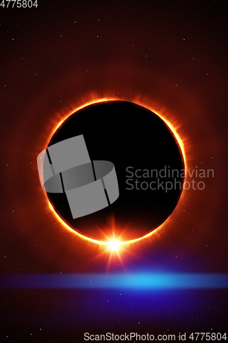 Image of total sun eclipse with stars and flare