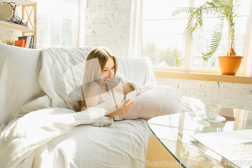 Image of Beautiful young woman relaxing at home, comfort and calm