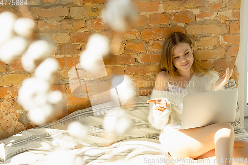 Image of Beautiful young woman relaxing at home, comfort and calm