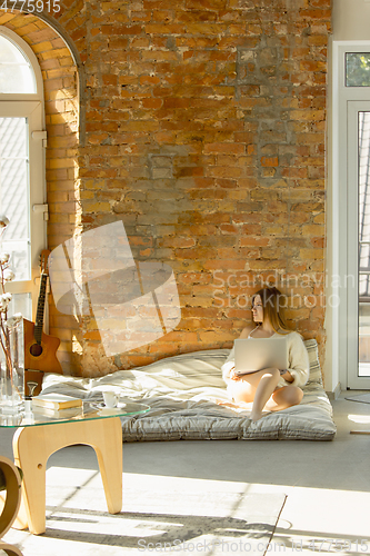 Image of Beautiful young woman relaxing at home, comfort and calm