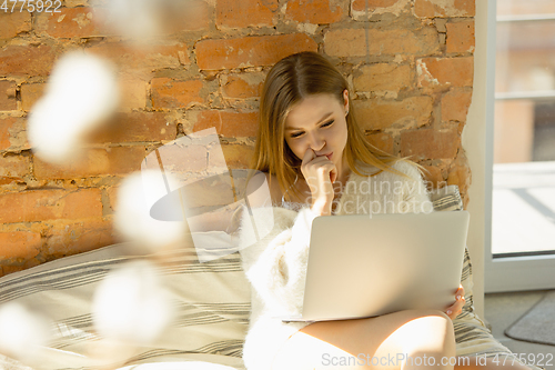 Image of Beautiful young woman relaxing at home, comfort and calm