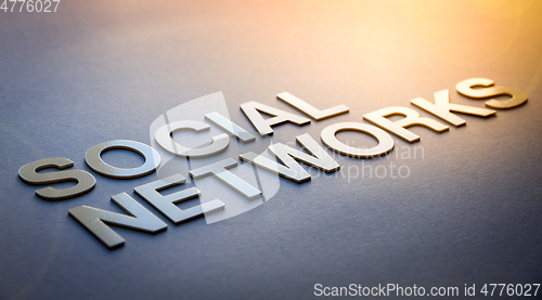 Image of Word social networks written with white solid letters