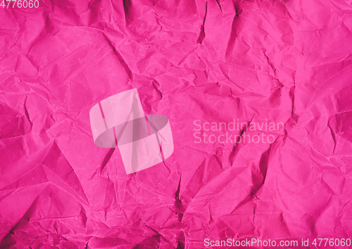 Image of pink crumpled paper texture background