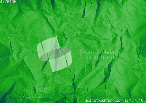Image of green crumpled paper texture background