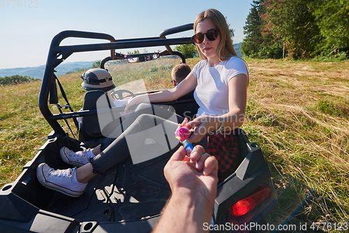 Image of  colorful torches while driving a off road buggy car