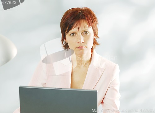 Image of A woman with a notebook