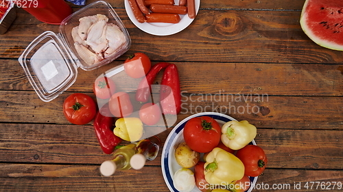 Image of Vegetables. Fresh Bio Vegetable and meat Over wooden Background. Top view