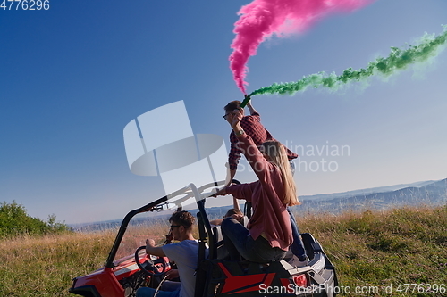 Image of  colorful torches while driving a off road buggy car