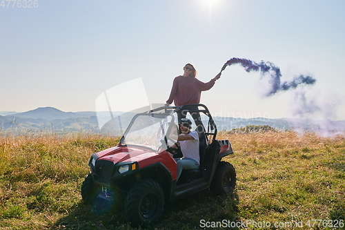 Image of  colorful torches while driving a off road buggy car