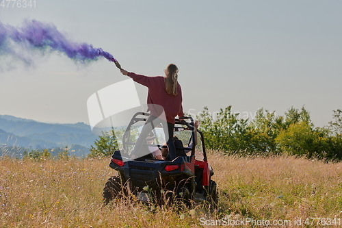 Image of  colorful torches while driving a off road buggy car