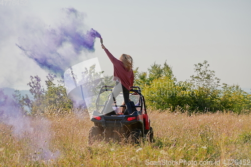 Image of  colorful torches while driving a off road buggy car