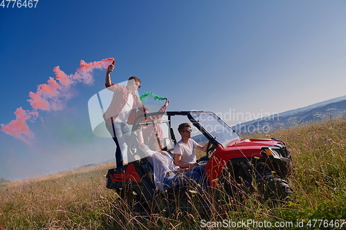 Image of  colorful torches while driving a off road buggy car