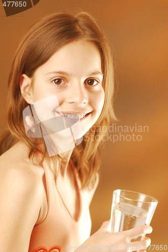 Image of A girl with a glass of water