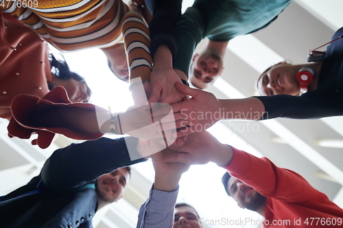 Image of students celebrating successfully finished project