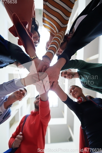 Image of students celebrating successfully finished project