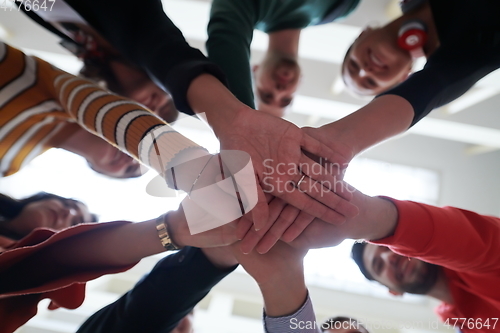 Image of students celebrating successfully finished project