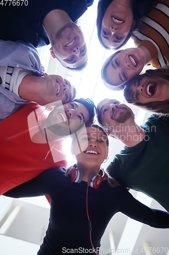 Image of group of happy young people showing their unity