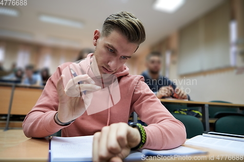 Image of the student uses a smartwatch in math class