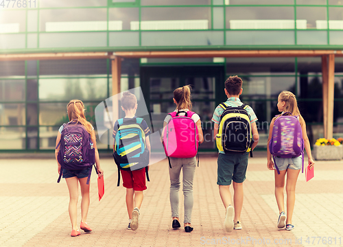 Image of group of happy elementary school students walking