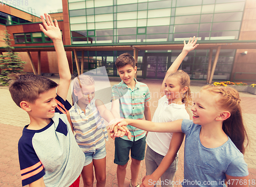 Image of group of happy elementary school students