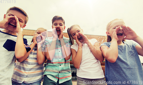 Image of group of happy elementary school students