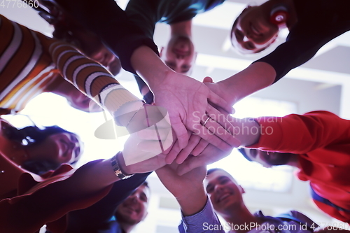 Image of students celebrating successfully finished project