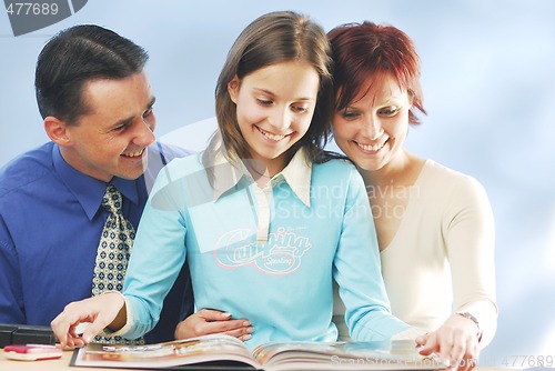 Image of A family with a book