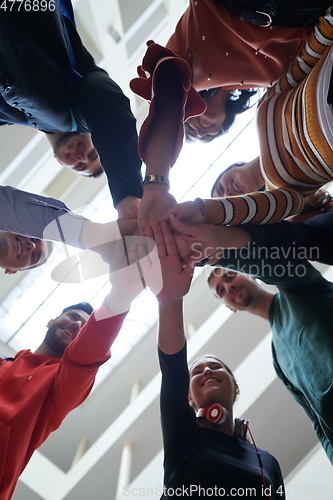 Image of students celebrating successfully finished project