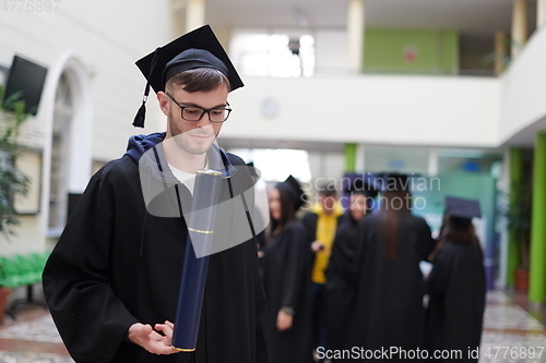 Image of portrait of student during graduation day