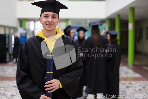 Image of portrait of student during graduation day