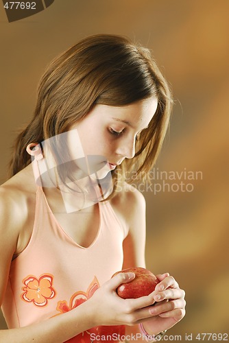Image of A girl with an apple