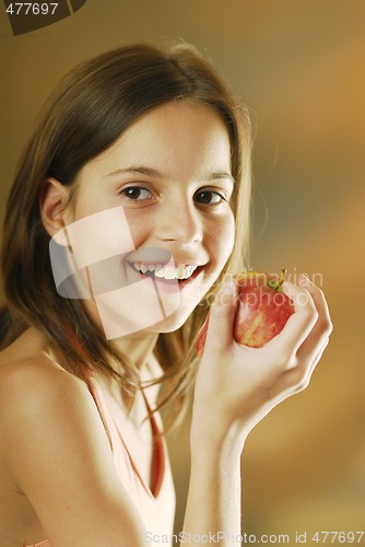 Image of A girl with an apple