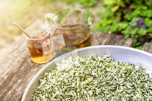 Image of verbena tea on old wooden planks