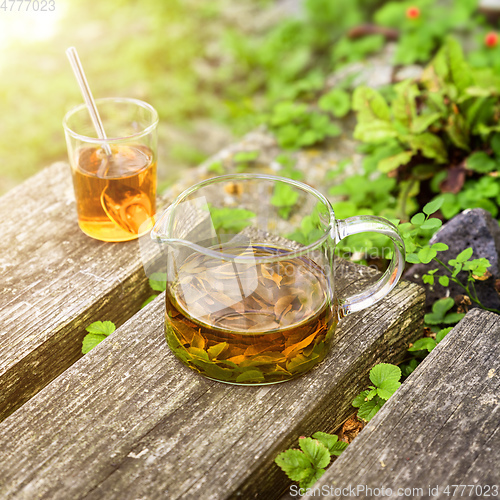 Image of verbena tea on old wooden planks