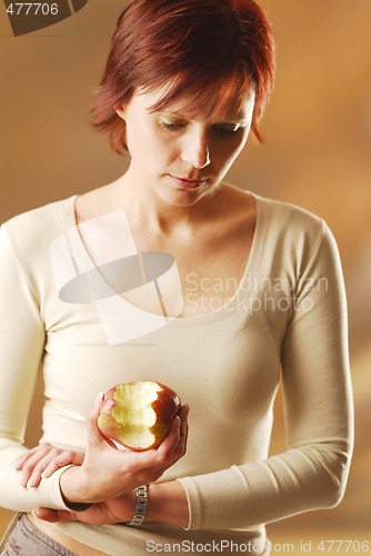Image of A woman with an apple