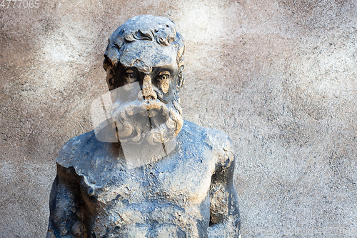 Image of old male statue