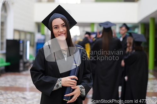 Image of portrait of student during graduation day