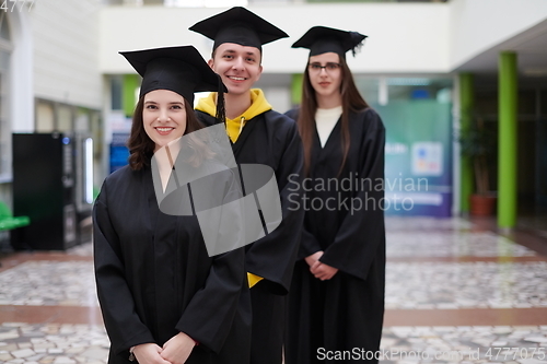 Image of Group of diverse international graduating students celebrating