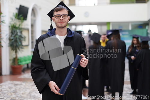 Image of portrait of student during graduation day