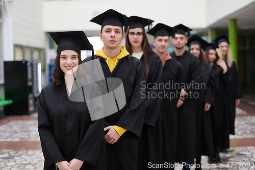 Image of Group of diverse international graduating students celebrating