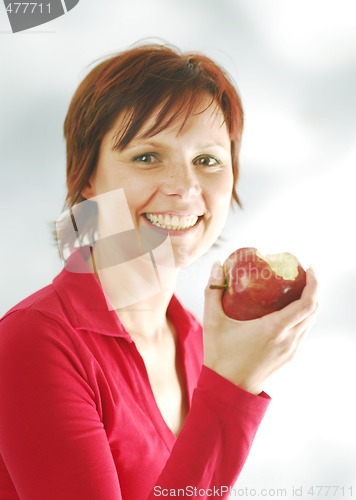 Image of A woman with an apple