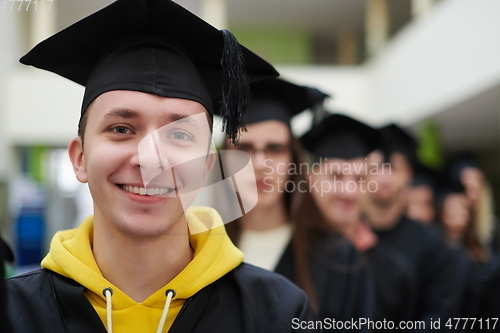 Image of Group of diverse international graduating students celebrating